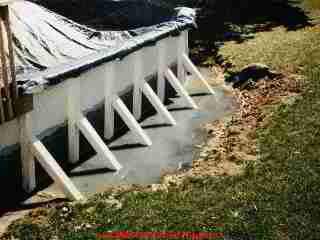 Photograph of a swimming pool installed too close to a septic drainfield - in failure (C) Daniel Friedman