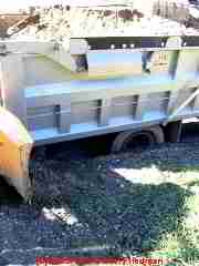 Photograph of  dump truck after it drove over and collapsed a seepage pit