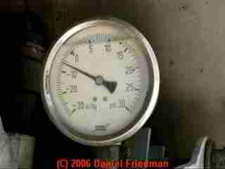 PHOTO of the septic pumper vacuum pump gauge