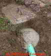 PHOTO of a repair at a septic tank leak at its
inlet pipe