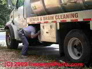 PHOTO of opening the septic pumper truck vacuum pump motor and controls