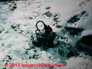Septic pump above ground © D Friedman at InspectApedia.com 