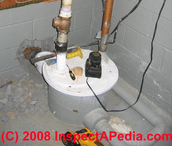 sewage ejector pump system for basement bathroom