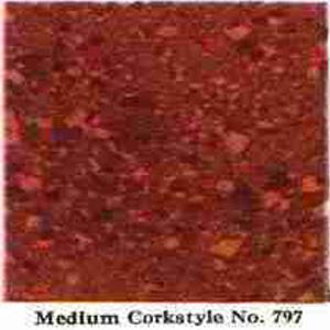 Medium cork pattern asbestos floor tile from 1956 (C) InspectApedia.com