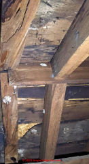 Wood leak stains under roof (C) InspectApedia.com Lesa