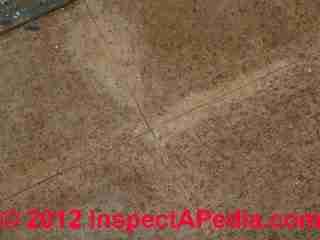 Vinyl asbestos floor tiles in cork tile pattern (C) InspectAPedia & GM