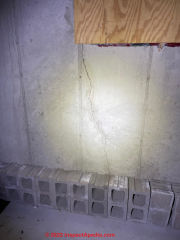 Diagonal concrete crack (C) InspectApedia.com Jeremy