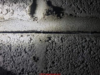 Mortar joint crack in block wall (C) InspectApedia.com Cory