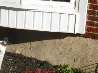 Hairlilne cracks at mortar joints in concrete block wall - CMU foundation - New Jersey (C) InspectApedia.com Chuck
