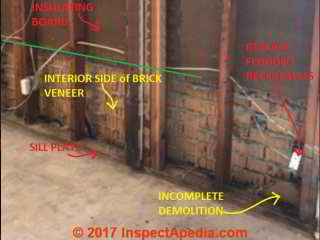 Interior view of brick veneer wall after partial demolition (C) InspectApedia.com bb Hurricane Harvey flood damage repair