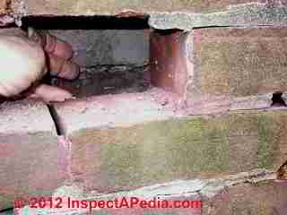 Brick wall frost damage © Daniel Friedman at InspectApedia.com