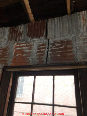 Structural clay block wall crack over window (C) InspectApedia.com Holly