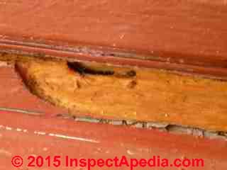 Insect damage at window frame (C) InspectApedia John Huie