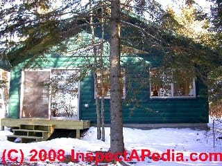 Log slab siding on a cabin