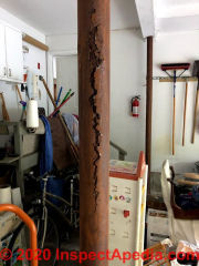 Severe splitting in steel lally column (C) Inspectapedia.com Clare