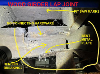 Bending breaking lap joint in wood beam, bent post top metal plate, further evalutaion & repair needed at main girder (C) InspectApedia.com Anon