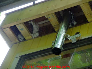 Bath exahust vent temporary support during soffit finishing (C) Daniel Friedman at InspectApedia.com