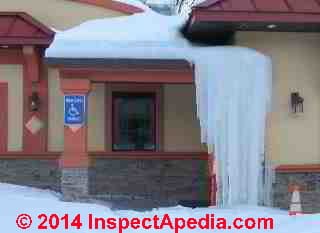 Roof ice dams built a tower of ice from eaves to ground at this Hyde Park NY Restaurant in 2014 © Daniel Friedman