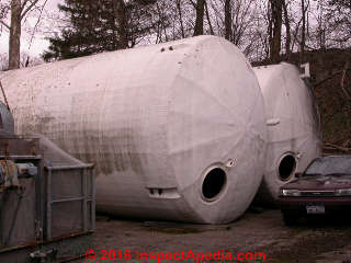 Apple juice storage tanks open for inspection, cleaning, re-application (C) Daniel Friedman at InspectApedia.com Highland NY