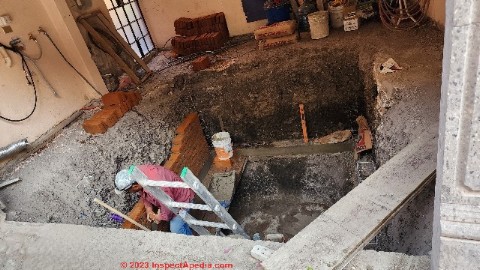 Constructing a vault and installing an in-ground cistern for water storage in San Miguel de Allende in 2023 (C) DJF InspectApedia.com