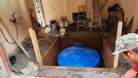 Constructing a vault and installing an in-ground cistern for water storage in San Miguel de Allende in 2023 (C) DJF InspectApedia.com