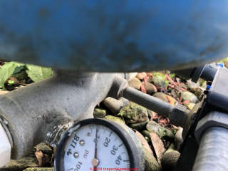 Tank tee at bottom of water pressure tank (C) InspectApedia.com Tom