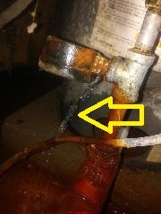 Severe leak at well pump water pressure gauge (C) Inspectapedia.com Reader