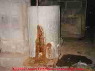 Severe corrosion and leak at a water storage tank (C) Daniel Friedman