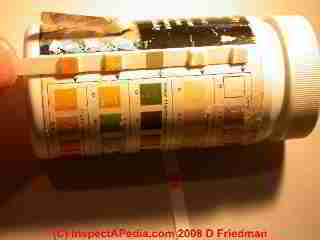 Water hardness strip test © D Friedman at InspectApedia.com 