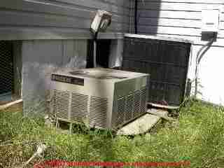 Photograph of air conditioning compressor condenser units with many problems
