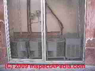 Air conditioner compressors too close (C) Daniel Friedman