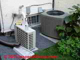 Photograph of air conditioning compressor condenser units with many problems
