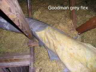 Photograph of  heat-deterioration of Goodman Gray Flex Duct in an attic
