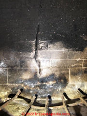 Fireplace crack needs investigation (C) InspectApedia.com CF