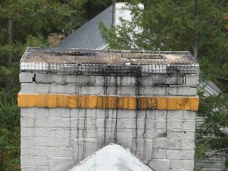 Soot leaking down a masonry chimney (C) Daniel Friedman