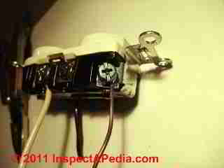 Electrical Outlet wire connections © D Friedman at InspectApedia.com 