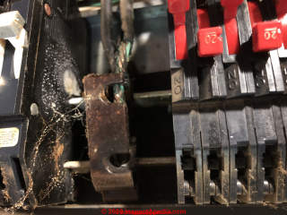 Overheated & damaged Zinsco electrical panel breakers & bus assembly (C) InspectApedia.com RandyG