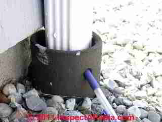 Orangeburg pipe as downspout drain © D Friedman at InspectApedia.com 