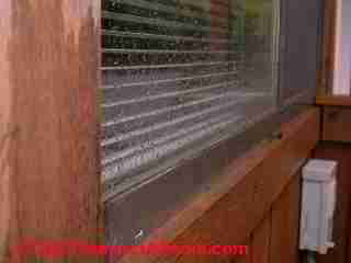 Lost seal on metal frame glider slider window © D Friedman at InspectApedia.com 