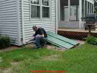 Photograph of - simple errors like this missing downspout elbow and extension can lead to a flooded basement 