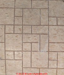 1955 white brick pattern flooring (C) InspectApedia.com Mel