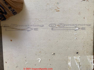 Asbestos possible in white backer on Armstrong floor tile - need to know age (C) InsepectApedia Jennifer