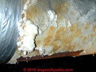 Asbestos duct wrap on HVAC duct in poor condition (C) Daniel Friedman