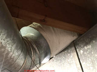 asbestos paper on the duct exteriors (C) InspectApedia.com Tim H