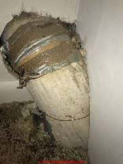 Asbestos on HVAC air duct (C) InspectApedia ES