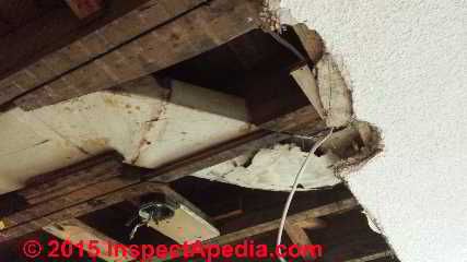 Asbestos paper HVAC duct insulation in poor condition (C) InspectAPedia A N-J
