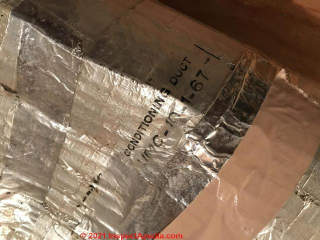 Foil-covered asbestos ductwork ca 1967 (C) InspectApedia.com Sam