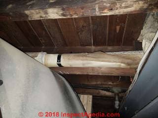 Asbestos pipe wrap inside of the return air duct of a New Jersey home (C) Daniel Friedman at InspectApedia.com