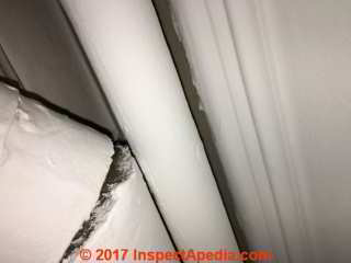 Felt type pipe insulation in a U.K. installation (C) InspectApedia.com D Friedman & JL
