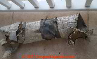 Asbestos HVAC Duct: sbestos paper reinforced with jute inside of an HVAC duct (C) InspectApedia.com Tina